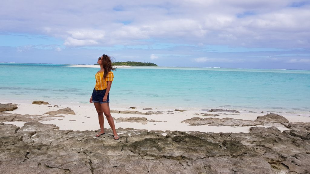 selfie in front of aitutaki lagoon