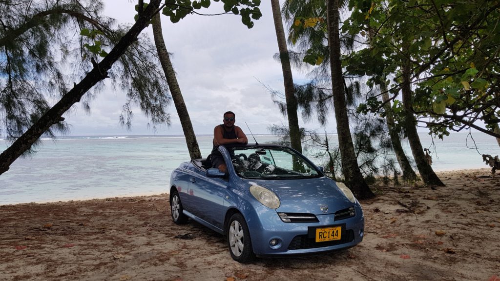 nissan convertible selfie at beach